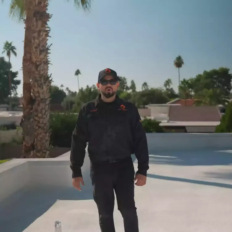 Expert plumber performing careful pipe repair — OX Plumbing workmanship