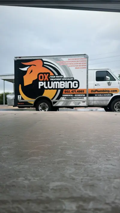 OX Plumbing box truck on site.