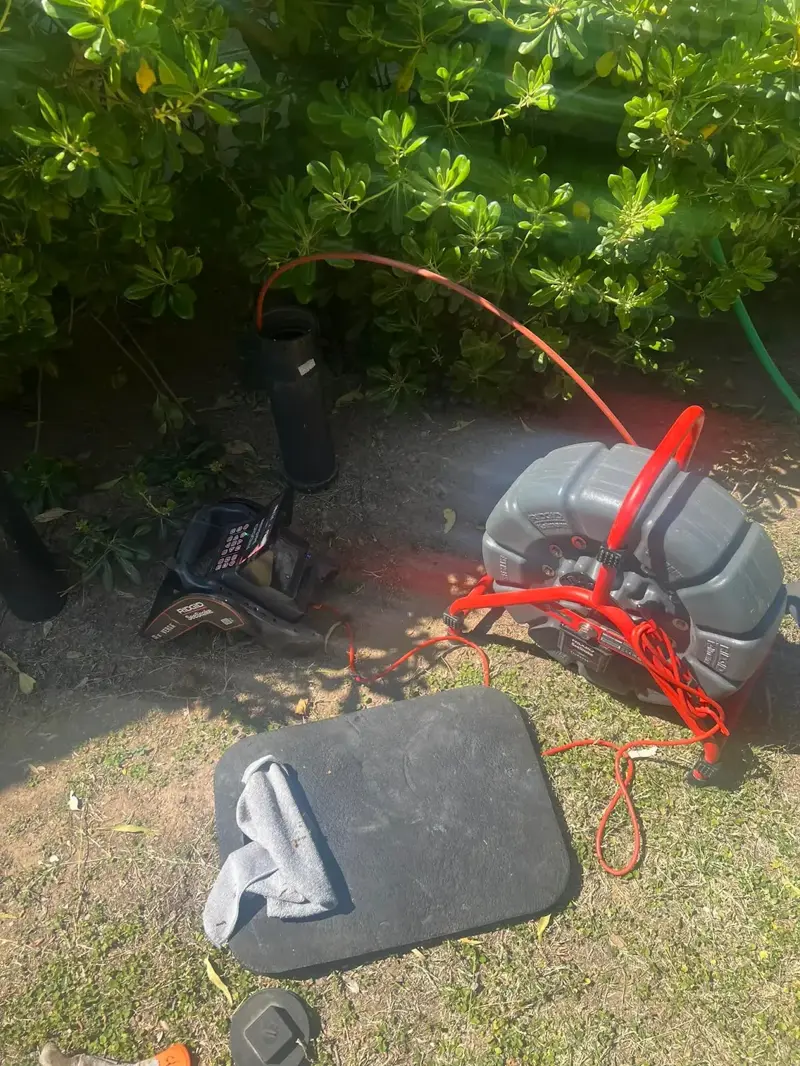 Sewer camera reel at a yard cleanout for a sewer line camera inspection.