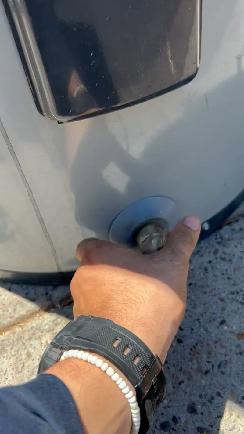 Water heater flush using the drain valve at the bottom of the tank.